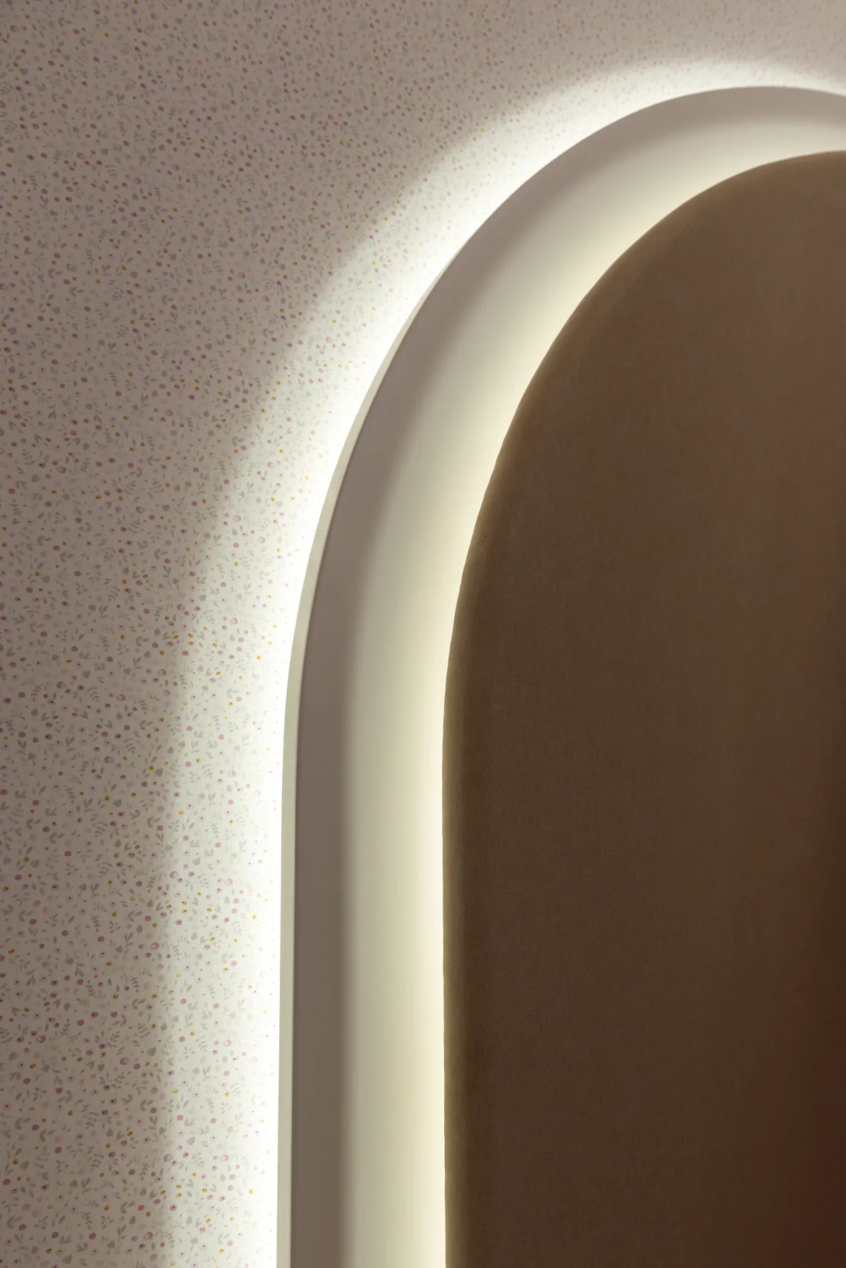 Arched wall light